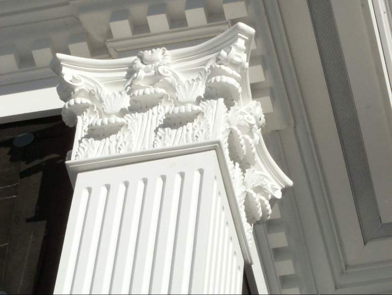 Corinthian Capital on square, fluted Column